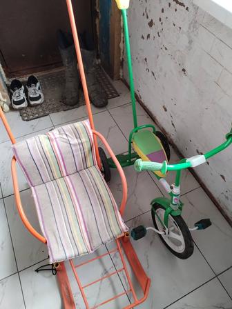 Продам детский велосипед и санки