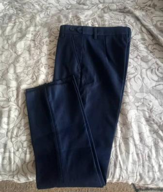 Продам школьные брюки тёмно-синего цвета 2 шт. 32 и 38 размеров .