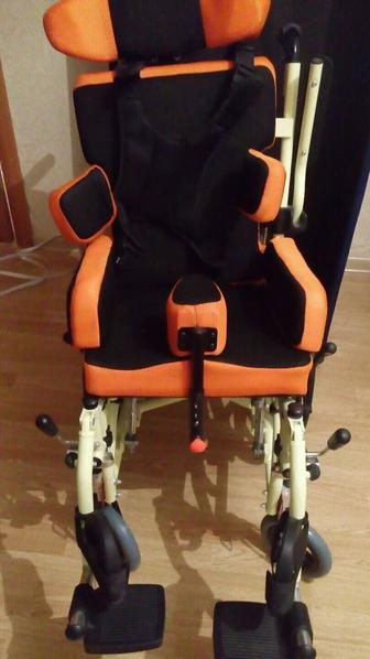 Инвалидная детская коляска