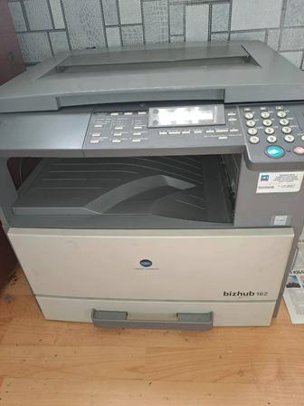 Продам ксерокс 3 в 1.сканер,принтер.серого цвета
