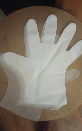 Перчатки одноразовые полителеновый размер М