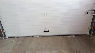 Продам ворота гаражные секционные почти новые