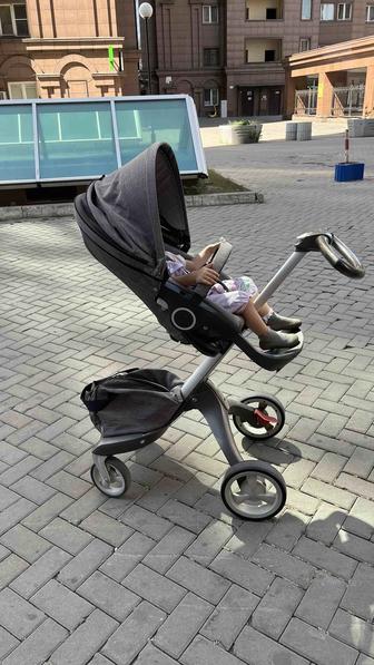 Коляска stokke