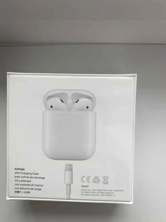 Продам наушники Airpods With charging case