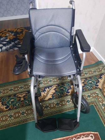 Электронная инвалидная коляска