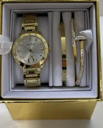 Часы и браслеты “Pandora”