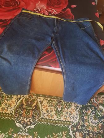 Продам темно- синие джинсы великан