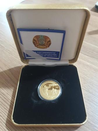 Золотая монета олимпийские игры биатлон с бриллиантами.