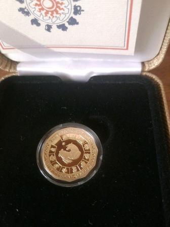 Год быка монета 7.78 гр. Au999, коллекционная