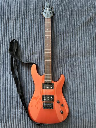 Электрогитара Cort KX100 плюс комплект начального гитариста