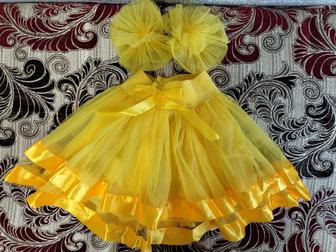 Детский желтый пышный юбка с красивым бантиком