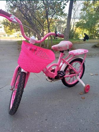 Розовый велосипед для девочки