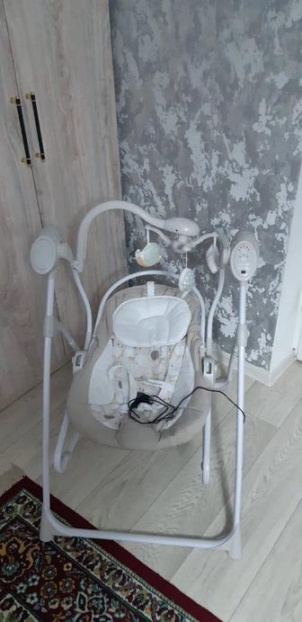 Электрокачеля для новорожденных