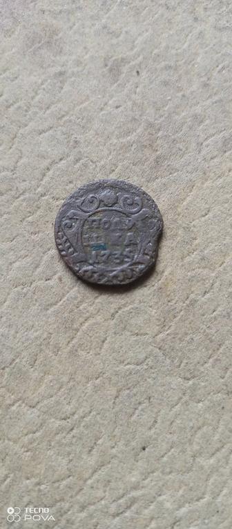 Монета полушка 1735 года.