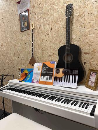 Профессиональное обучение игре на домбре, гитаре, фортепиано