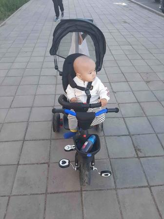 Детский трехколесный велосипед-коляска