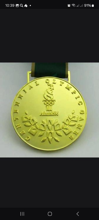 Медаль олимпийских игр 1996 г Атланта,100 летние Олимпийских игр