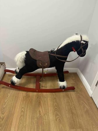 Продам игрушечную лошадку